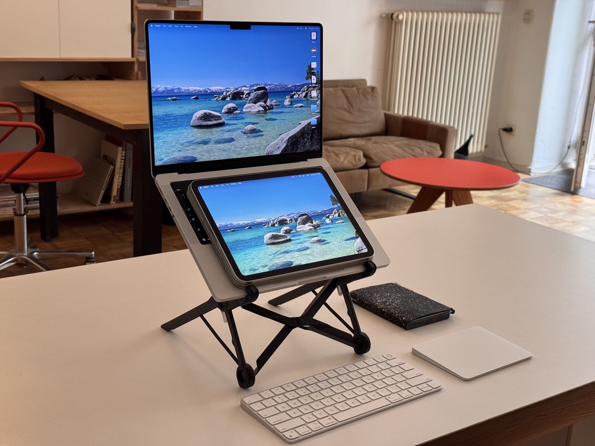 MacBook with an iPhone perched above its screen as a second display — the Mactendo DS setup